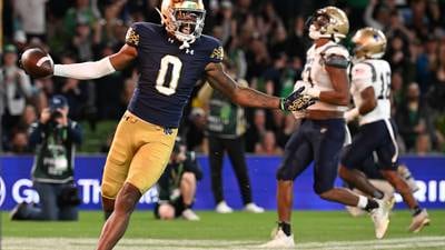 Sam Hartman throws 4 TD passes as No. 13 Notre Dame opens with a 42-3 win over Navy in Ireland