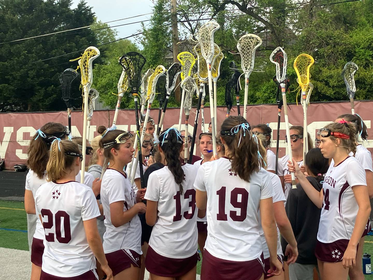 Sticks up, the Towson girls lacrosse team stands alone atop Baltimore County after defeating rival Hereford, 14-8, on Wednesday.