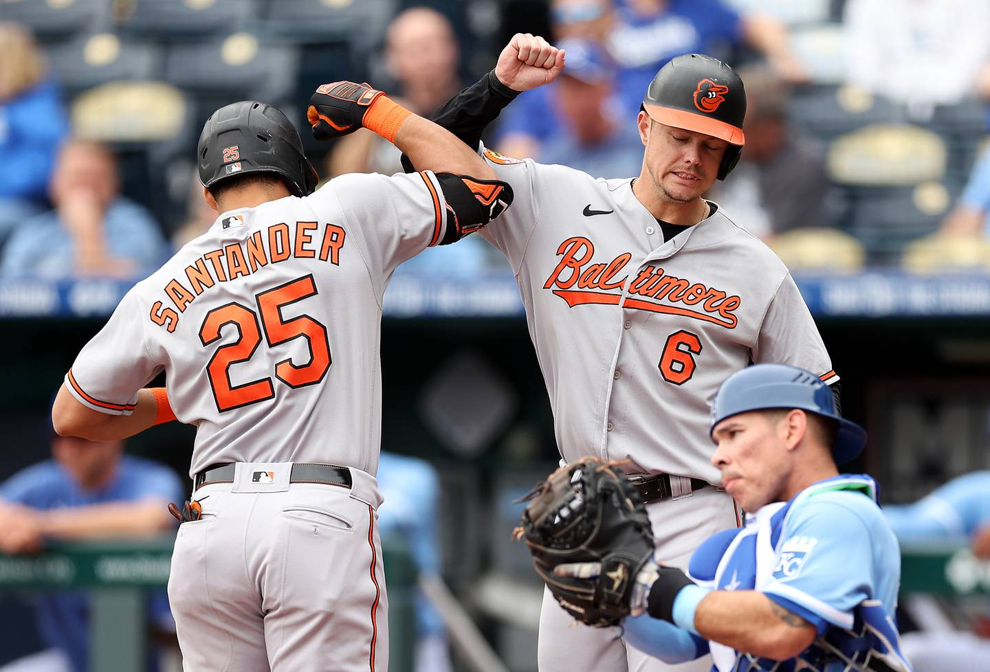 Anthony Santander #25 of the Baltimore Orioles is congratulated by Ryan Mountcastle #6 after hitting a 2-run home run during the 1st inning of the game against the Kansas City Royals at Kauffman Stadium on May 04, 2023 in Kansas City, Missouri.
