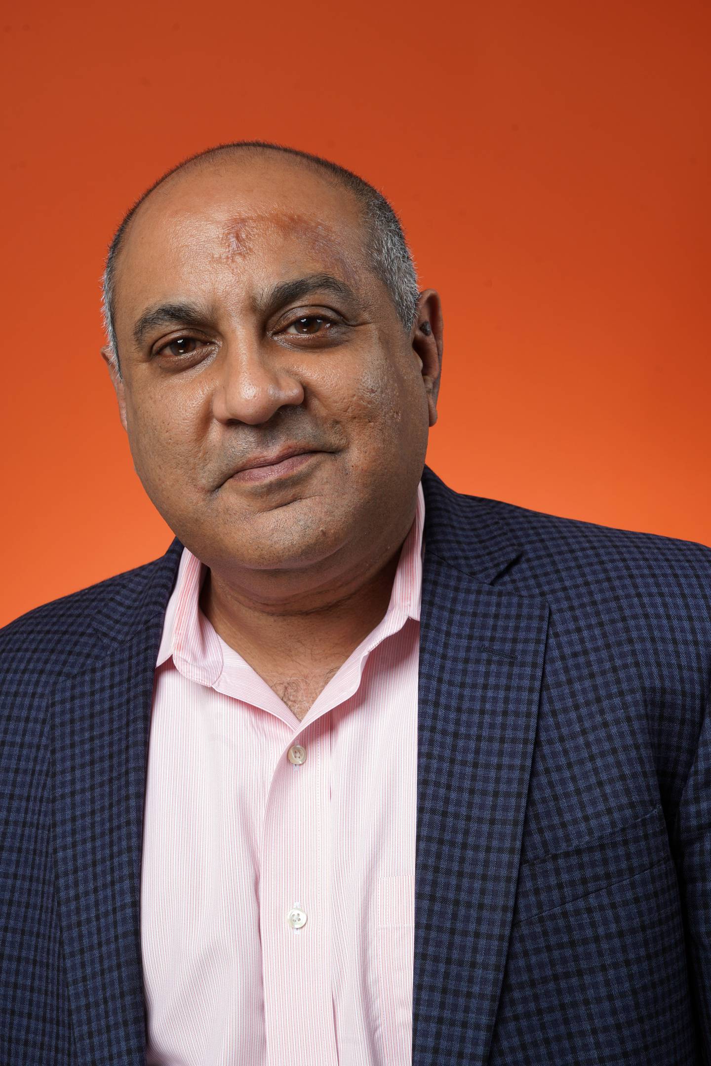 Headshot of Publisher and CEO of The Baltimore Banner, Imtiaz Patel.