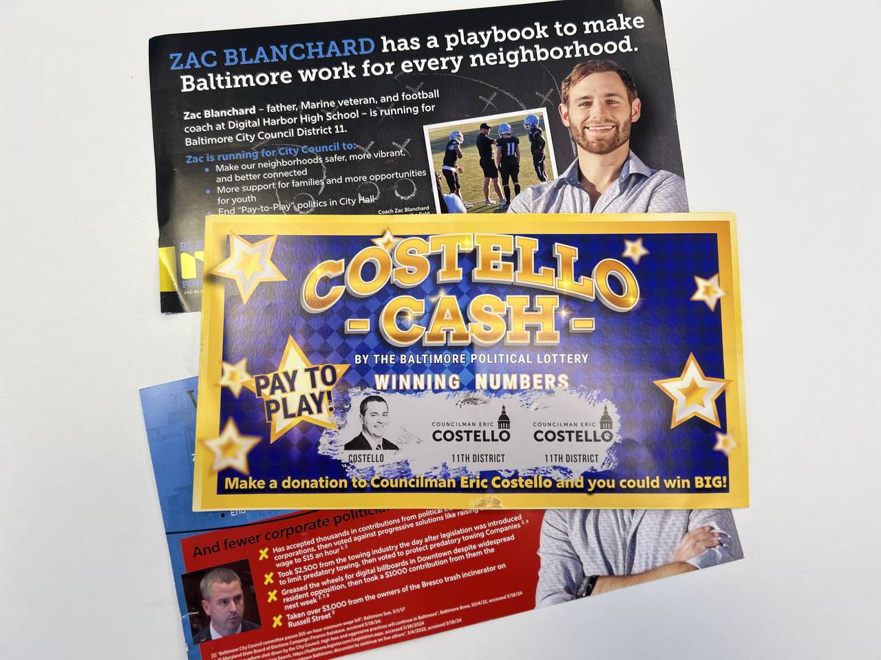 A mailer sent by Blanchard's campaign is designed to look like a scratch-off lottery ticket, saying: "Make a donation to Councilman Eric Costello and you could win BIG!"