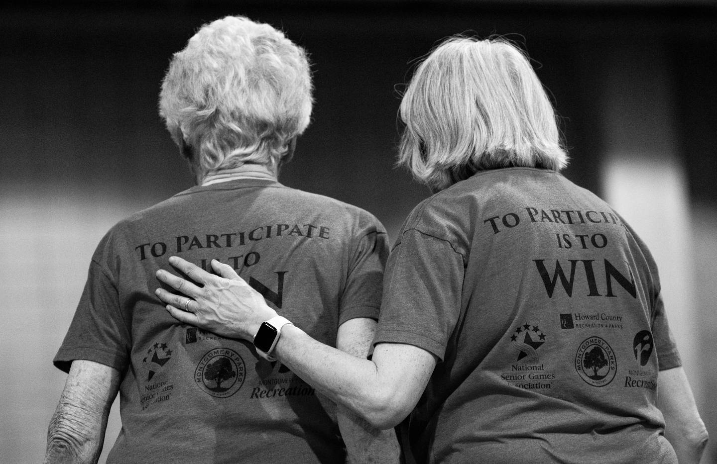 Yvonne Kronlage, of Sykesville, and Pauline Jensen, of Columbia, console each other after losing in doubles in table tennis, during the National Senior Games at David L. Lawrence Convention Center, in Pittsburgh, Friday, July 14, 2023.