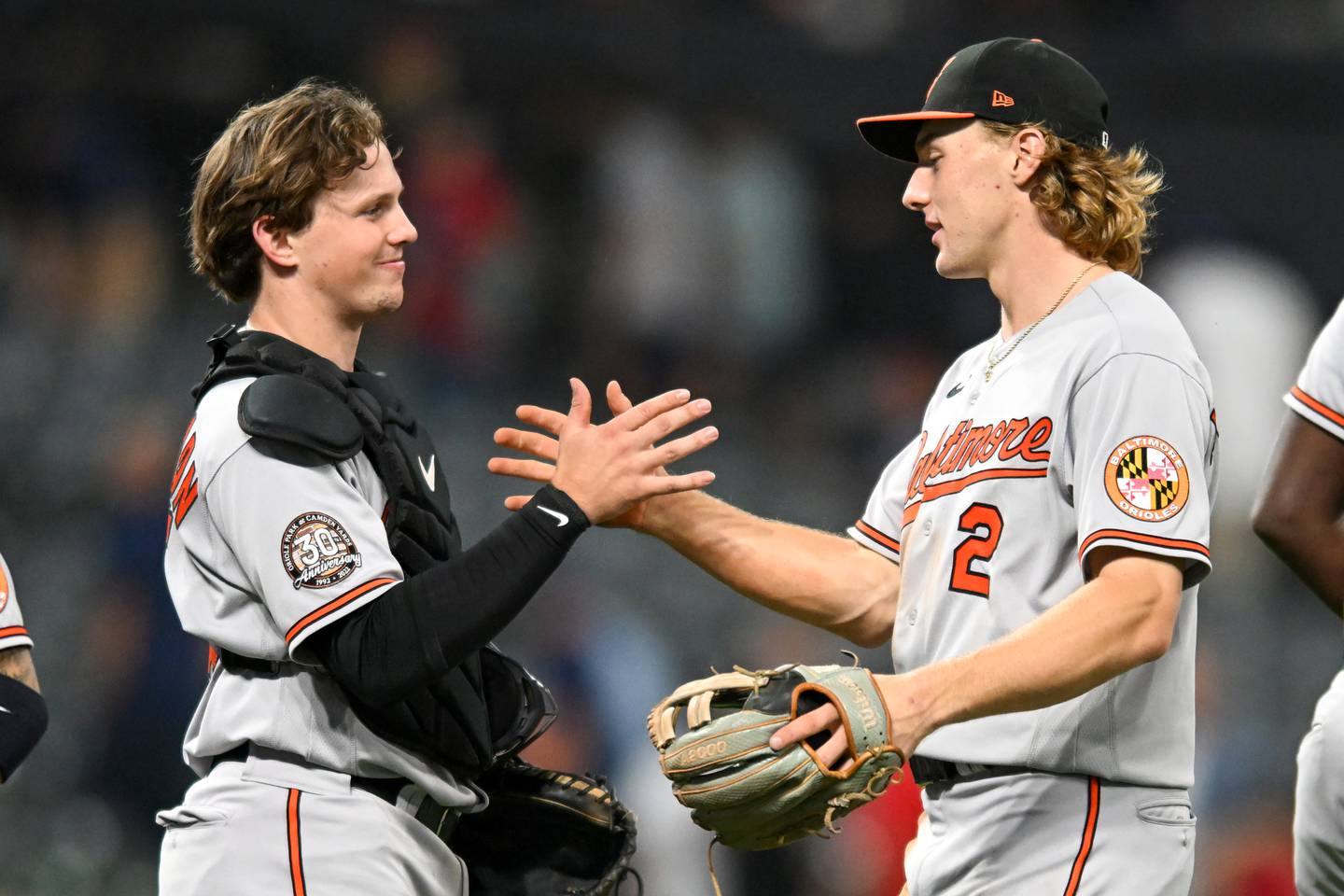 CLEVELAND, OH - AUGUST 31: Adley Rutschman #35 and Gunnar Henderson #2 of the Baltimore Orioles celebrate the team's 4-0 win over the Cleveland Guardians in Henderson's Major League debut at Progressive Field on August 31, 2022 in Cleveland, Ohio.