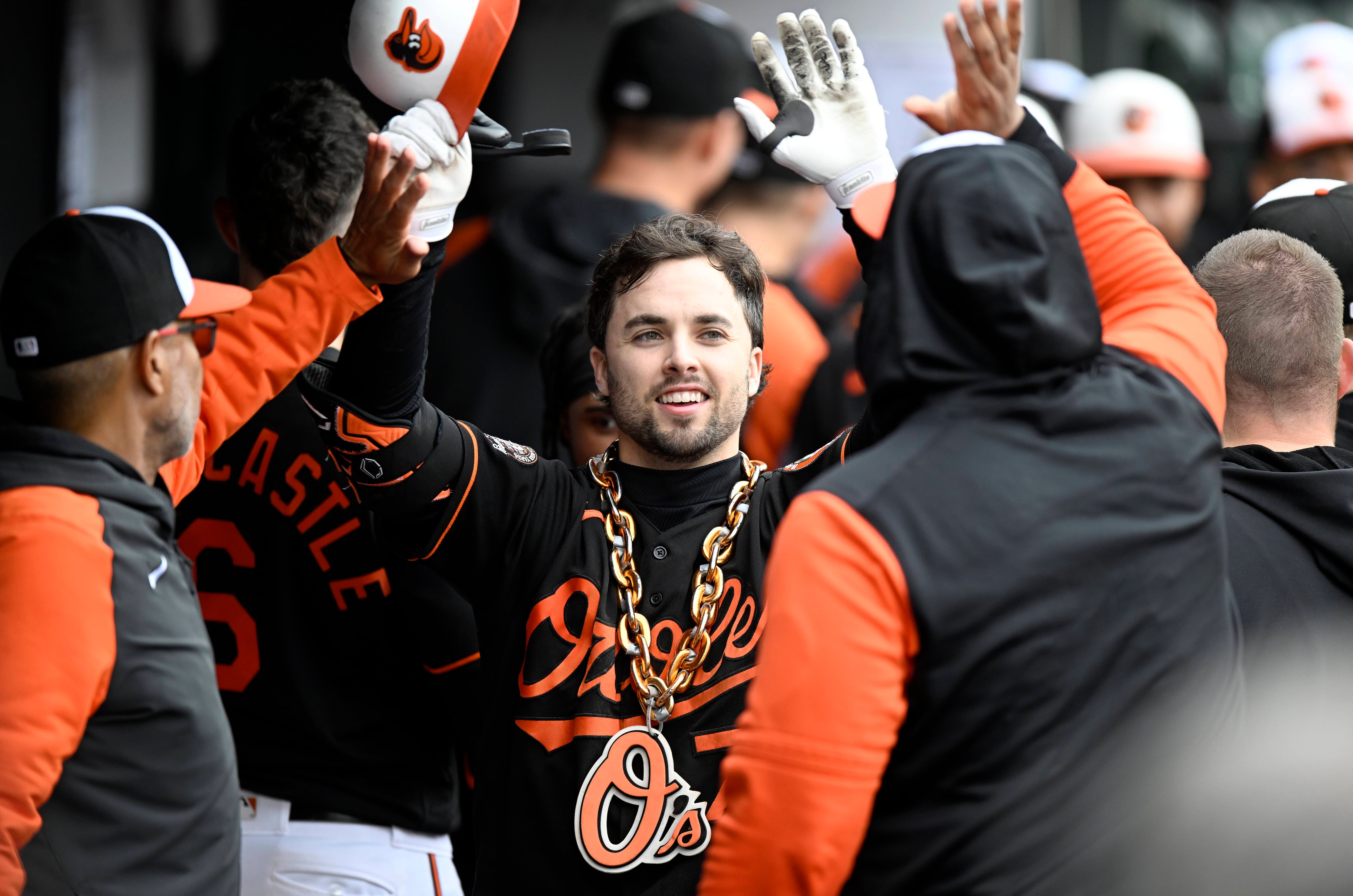 BALTIMORE, MARYLAND - OCTOBER 05: Terrin Vavra #77 of the Baltimore Orioles celebrates with teammates after hitting a three-run home run for his first career home run in the eighth inning against the Toronto Blue Jays during game one of a doubleheader at Oriole Park at Camden Yards on October 05, 2022 in Baltimore, Maryland.