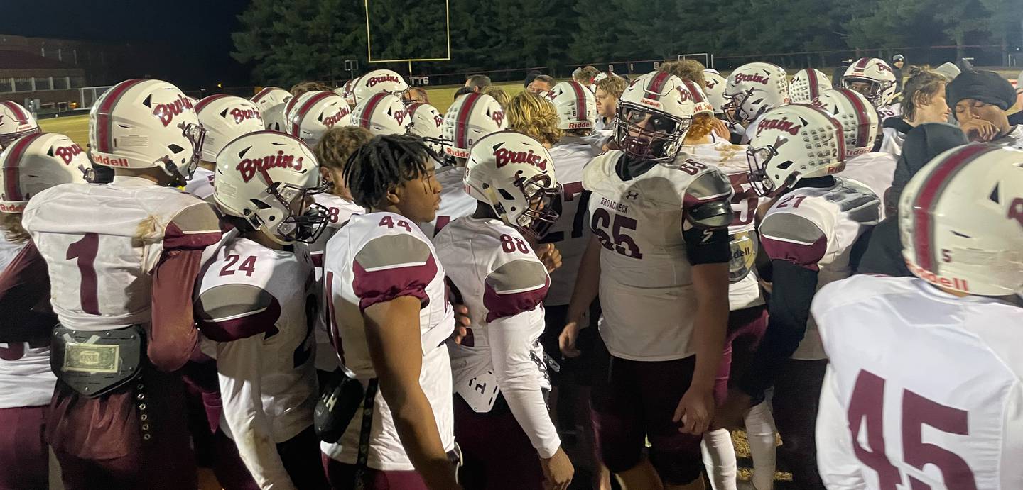 Broadneck football players gather after Friday's Class 4A state semifinal contest with Quince Orchard. The No. 8 Bruins' 11-game winning streak was ended by the defending state champs from Montgomery County.