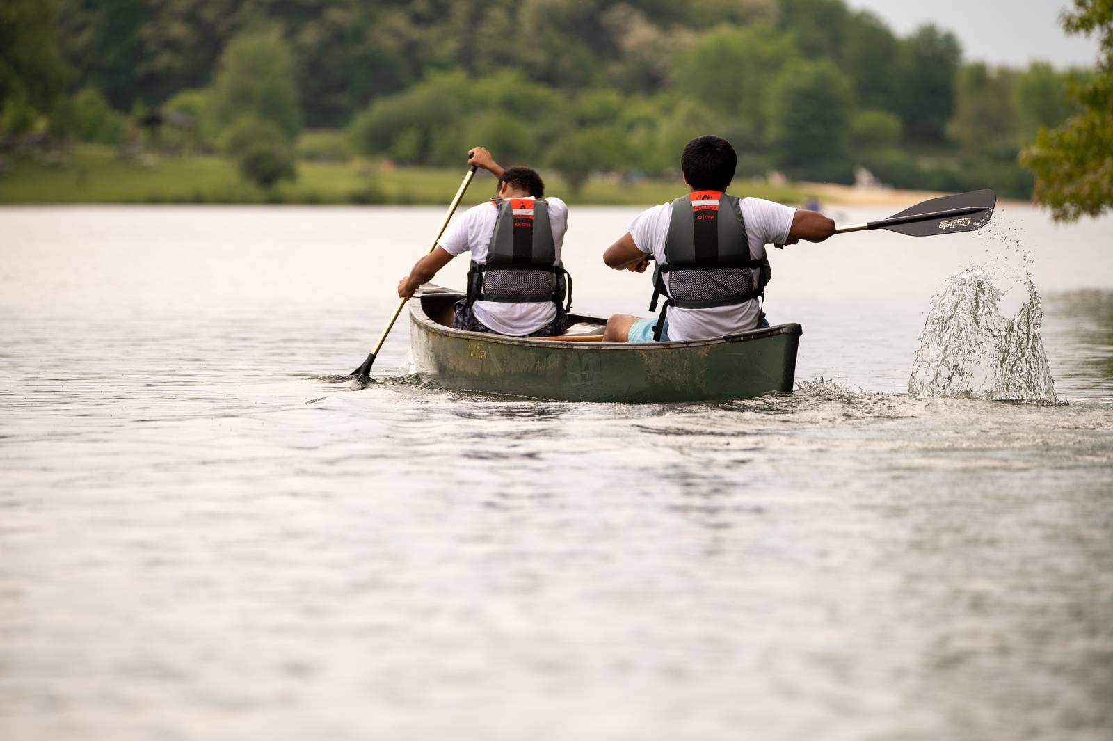 Two youths from GRYC steer a canoe during a two hour canoe trip on Lake Habeeb on Saturday May 20, 2023.