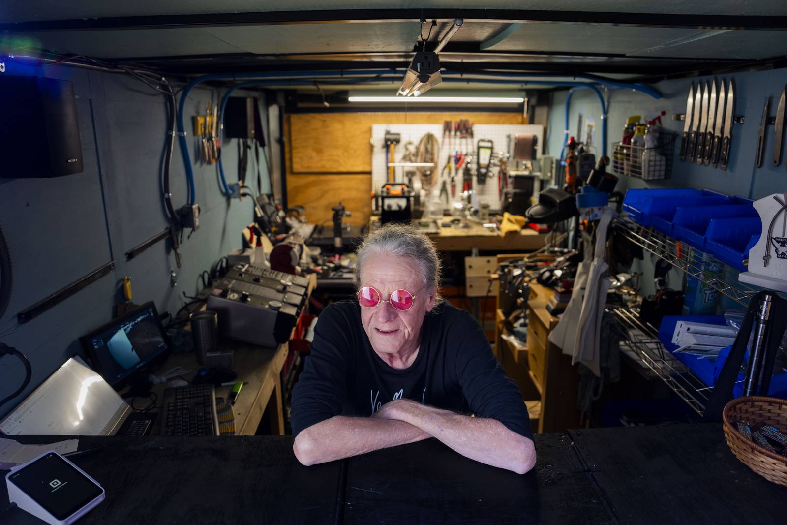 Robyn Webb has a knife sharpening business, Parkville Knives, at his house in a trailer outside. He is pictured preparing for the busy Thanksgiving season on November 9, 2023.