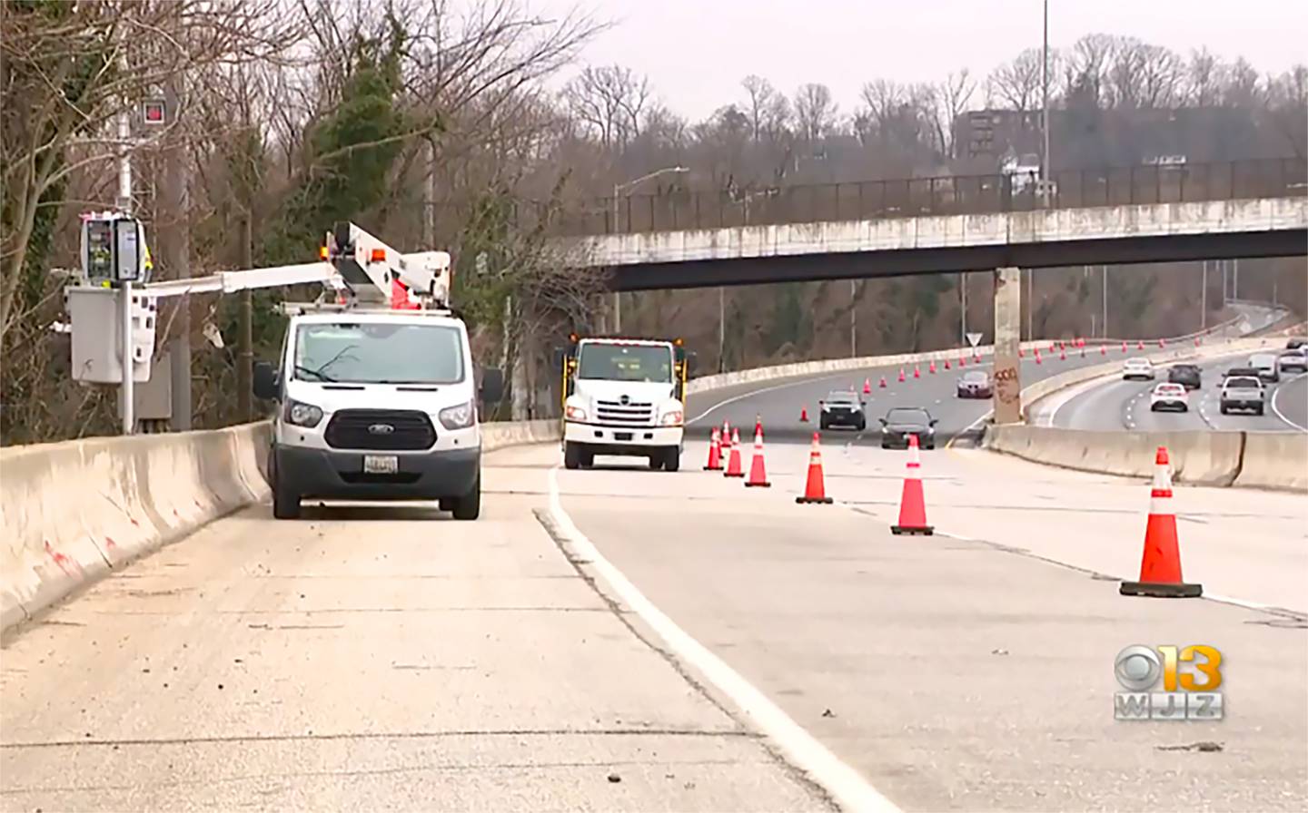 Crews work on installing speed Cameras On I-83 In Baltimore.