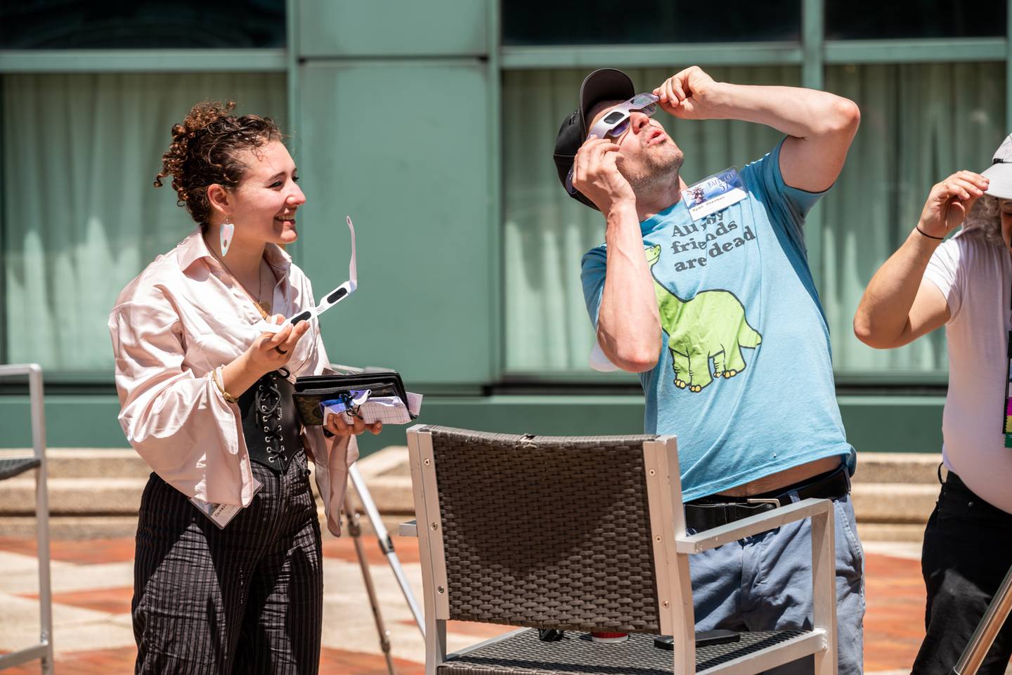 (L to R) Cassie Gologorsky and Ryan Sherman, both of Manchester, New Hampshire, use special protective glasses to look at the sun during the Safe Solar Observation workshop. Balticon 57 at Renaissance Harborplace Hotel, Baltimore, Maryland.
