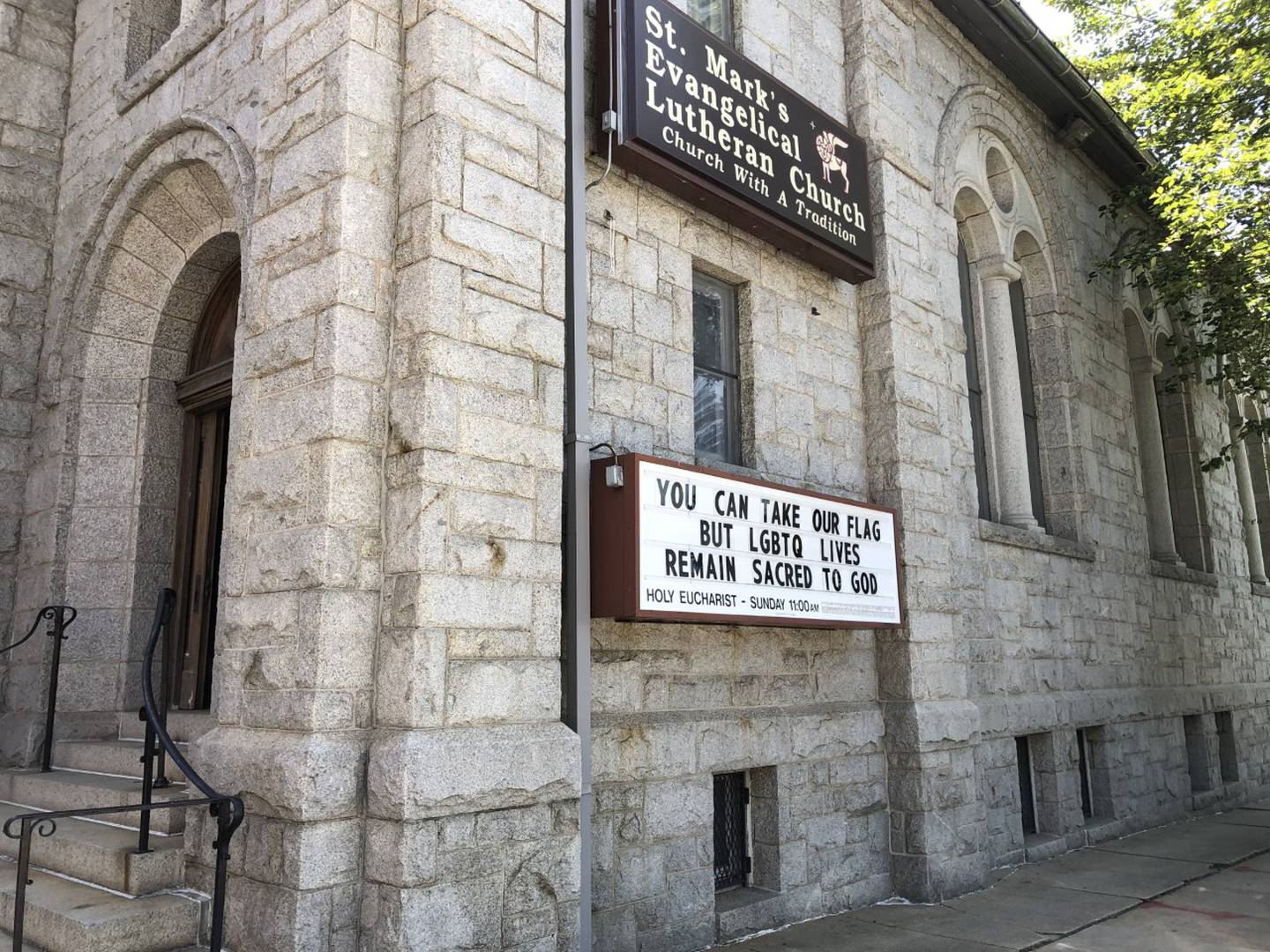 After someone removed the LGBTQ pride flag from the church, the congregation changed the message on the signboard.