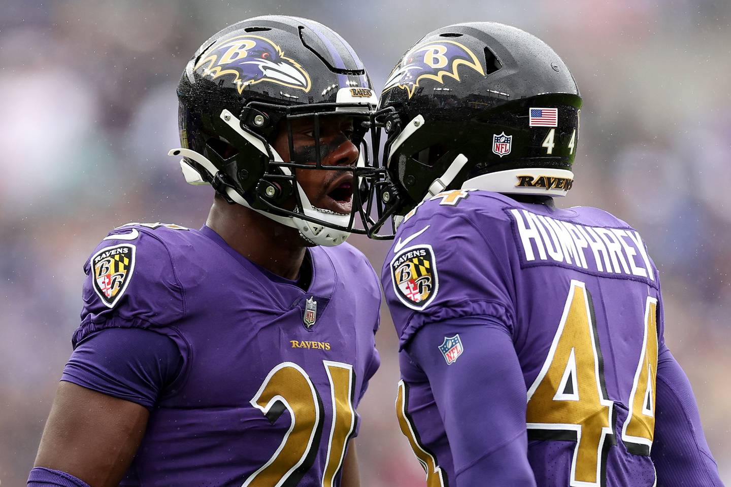 BALTIMORE, MARYLAND - OCTOBER 02: Brandon Stephens #21 and Marlon Humphrey #44 of the Baltimore Ravens celebrate after Humphrey made an interception in the first quarter against the Buffalo Bills at M&T Bank Stadium on October 02, 2022 in Baltimore, Maryland.