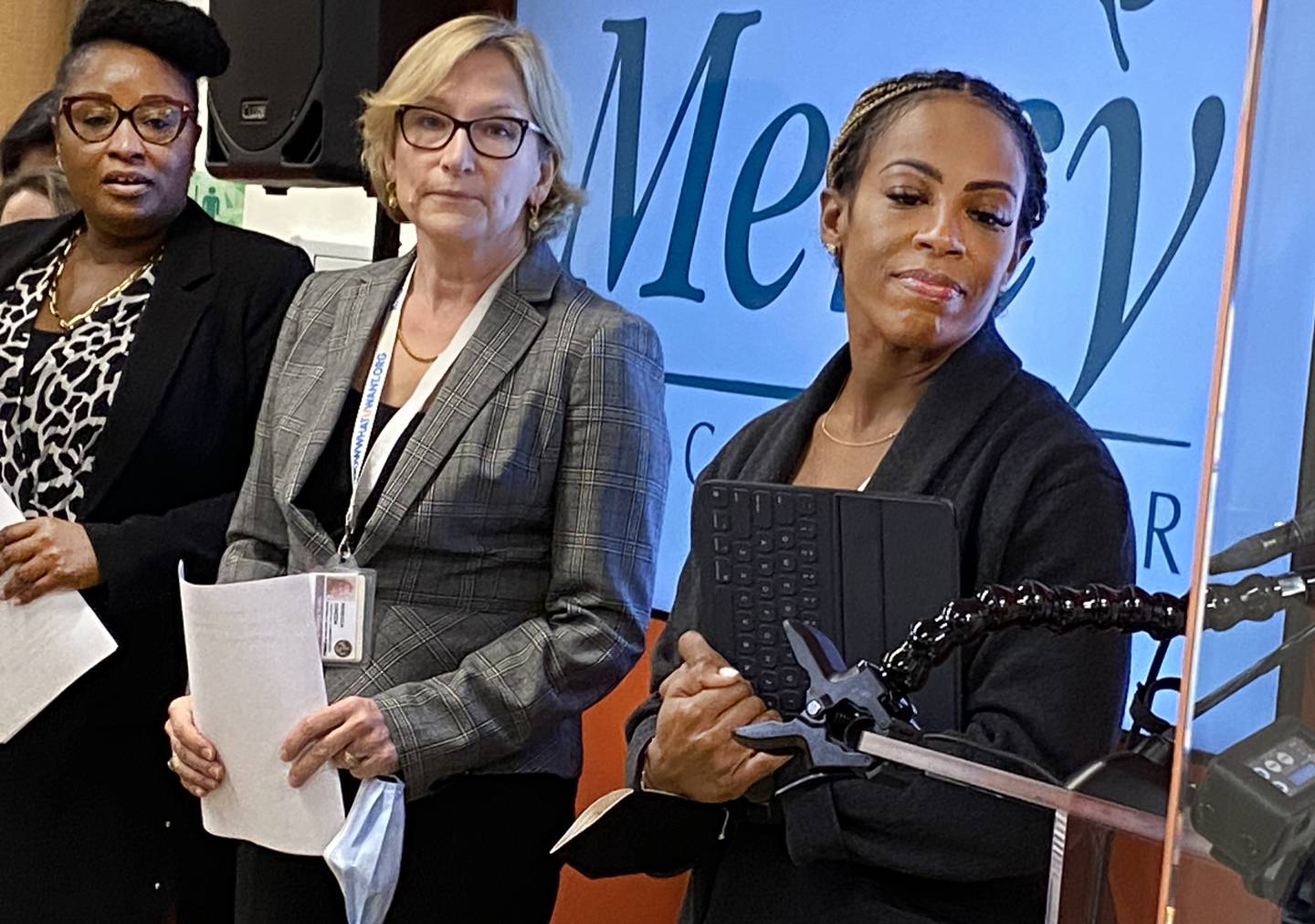 (l to r) Corine Mullings, deputy director of Baltimore's Department of Social Services;, Rebecca Dineen, Dr. Letitia Dzirasa (assistant Heath commissioner and health commissioner) of Mercy Medical Center speaks at the news conference on the rise of infant deaths.