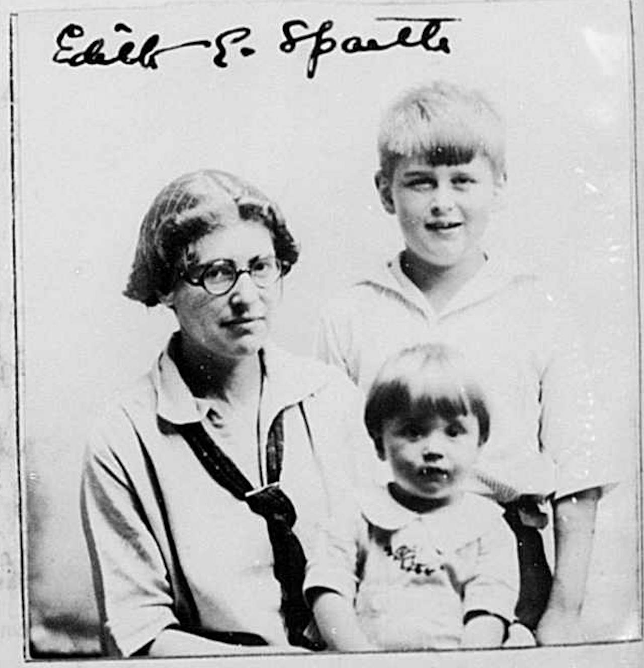 A photo of Edith E. Taussig with her children Walter and Elinor that was attached to a 1924 passport application.