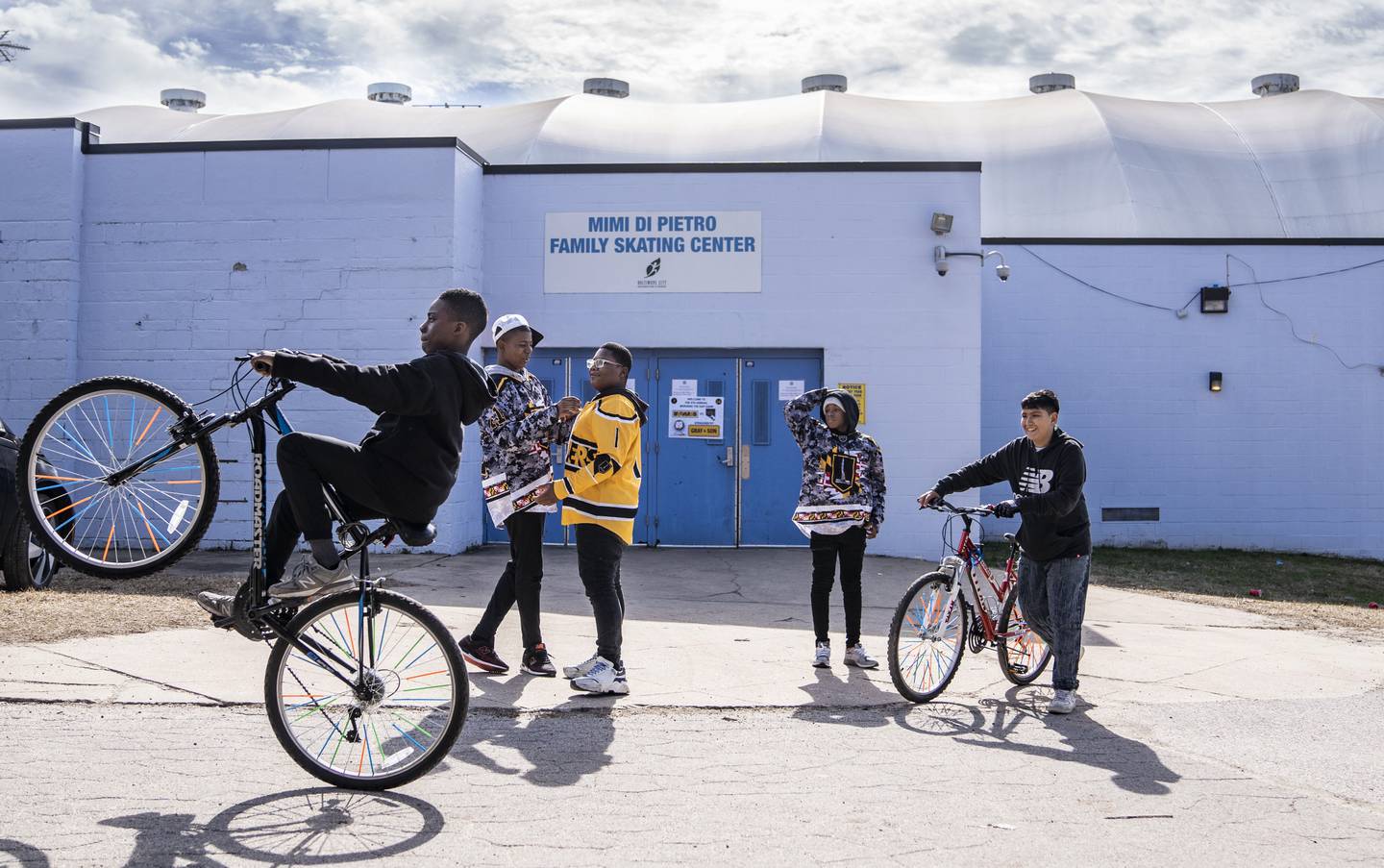 Michael Washington, Taavon Griffin, Donteze Branch, Reggie Gornish, and Yoni Portillo, all socialize outside of  Mimi DiPietro Family Skating Center after a game, in Baltimore, February 19, 2023.