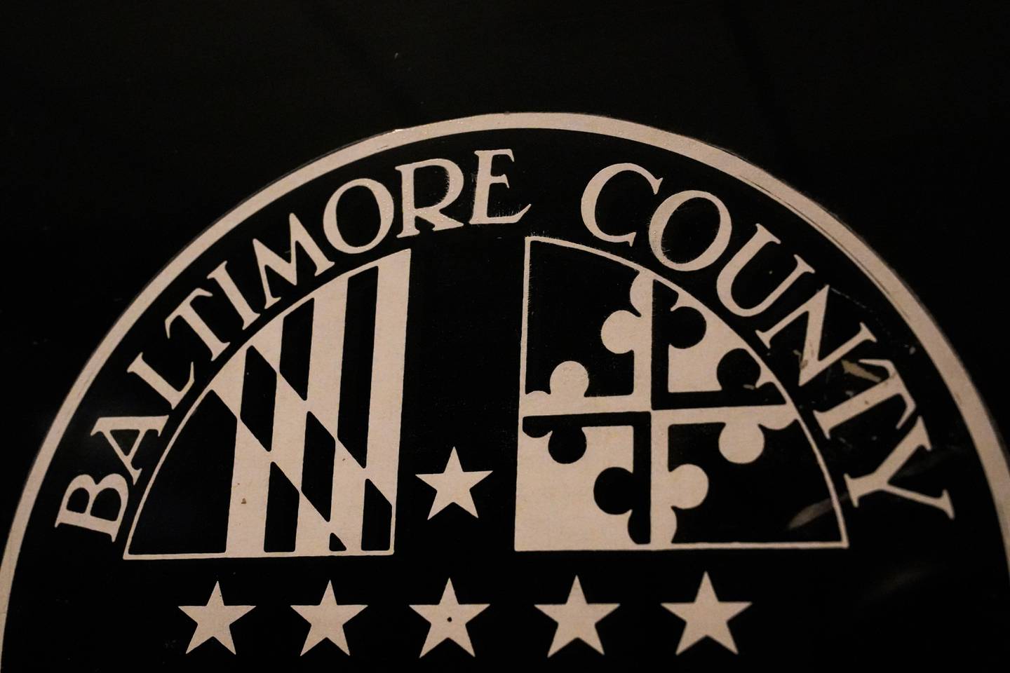 6/16/22—A decal reading “Baltimore County Maryland” is on a door inside the historic Baltimore County Courthouse in Towson, the center of county government.