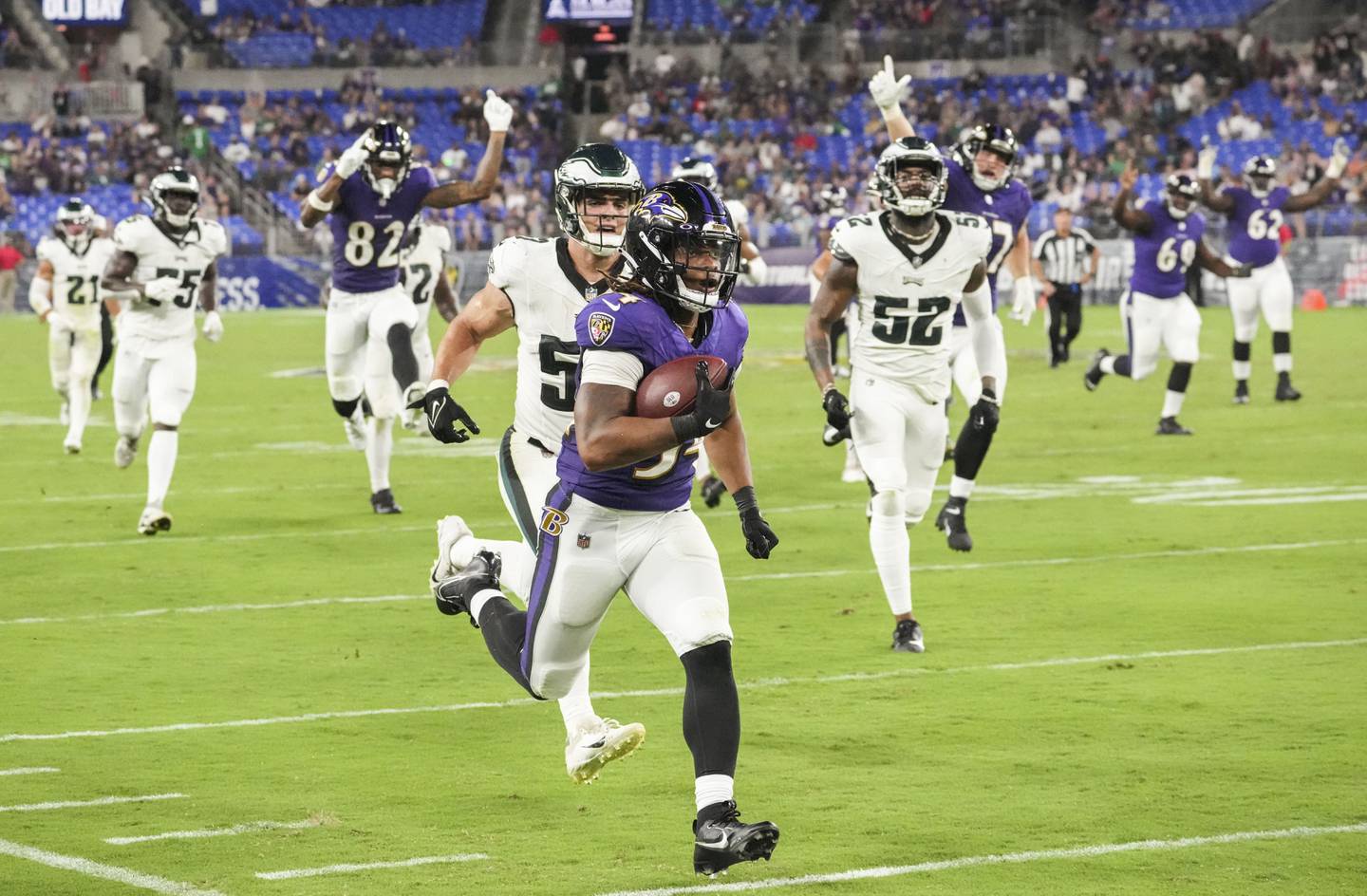 Baltimore Ravens running back Keaton Mitchell (34) take the ball down the field against the Philadelphia Eagles during a preseason game at M&T Bank Stadium on Saturday, August 12, 2023.