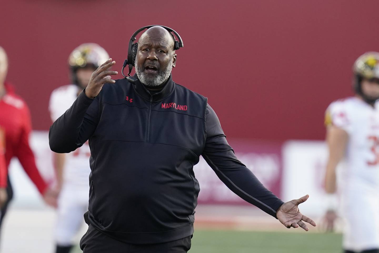 Maryland head coach Mike Locksley questions a call during the second half of an NCAA college football game against Indiana, Saturday, Oct. 15, 2022, in Bloomington, Ind