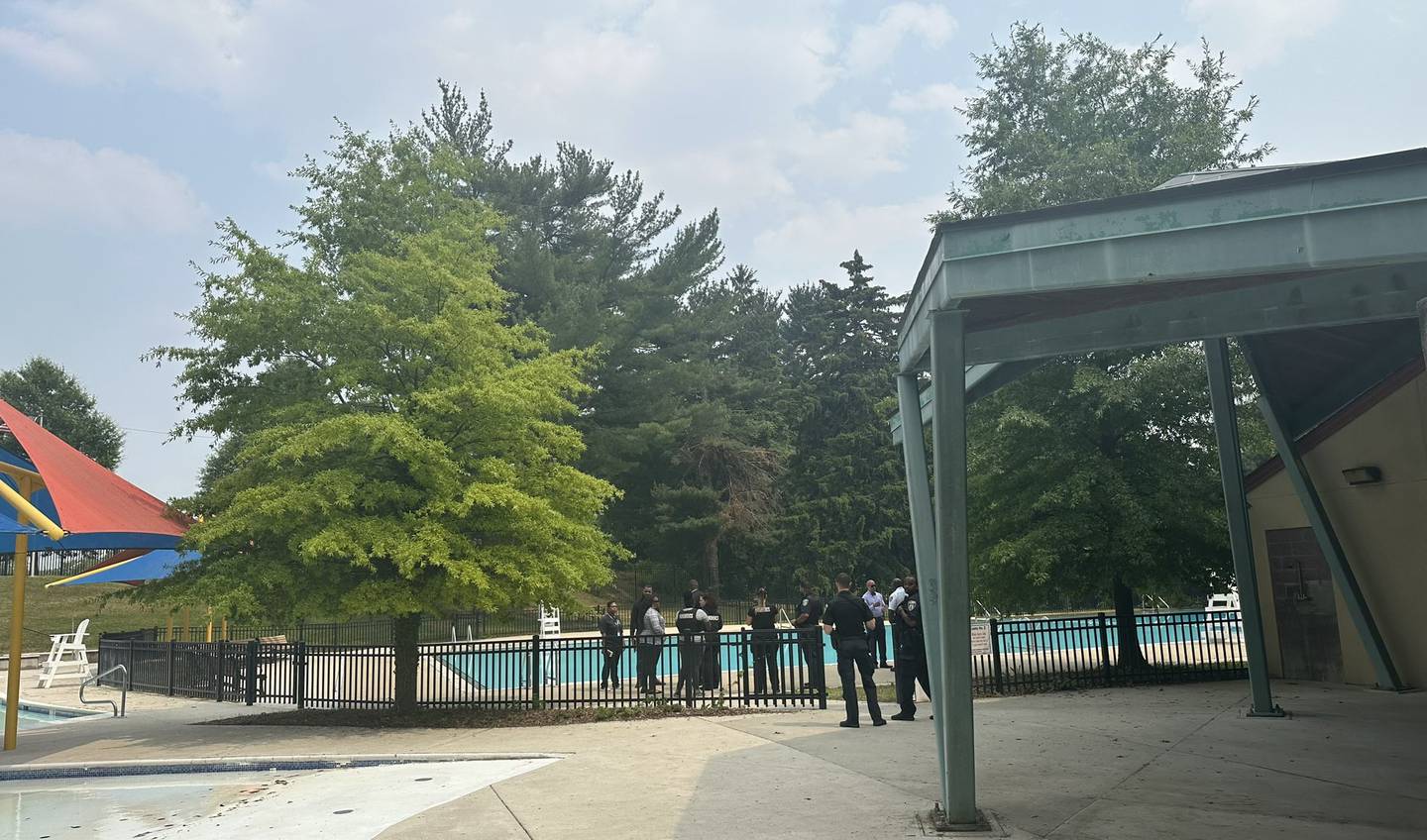 Police officers on scene at the Roosevelt Park Pool on the afternoon of June 7.