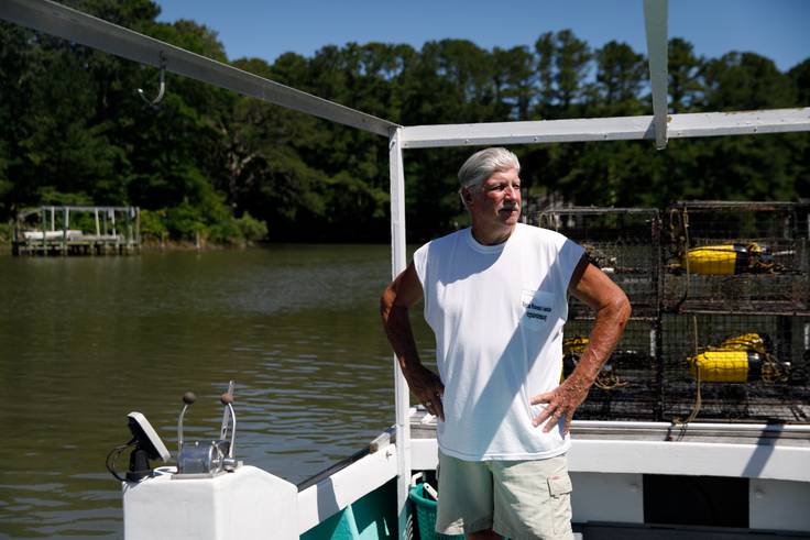 Crabber JC Hudgins is photographed on his boat in Mathews, Va., on Friday, June 10, 2022.