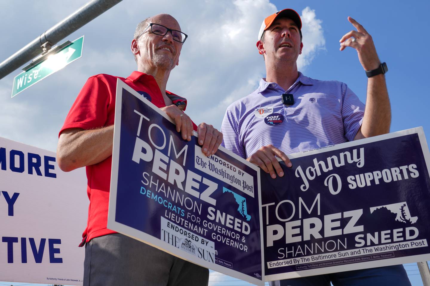 7/15/22—Democratic gubernatorial candidate Tom Perez, left, and Baltimore County Executive Johnny Olszewski, Jr. campaign together at the corner of Wise Ave. and Merritt Blvd. in Dundalk.
