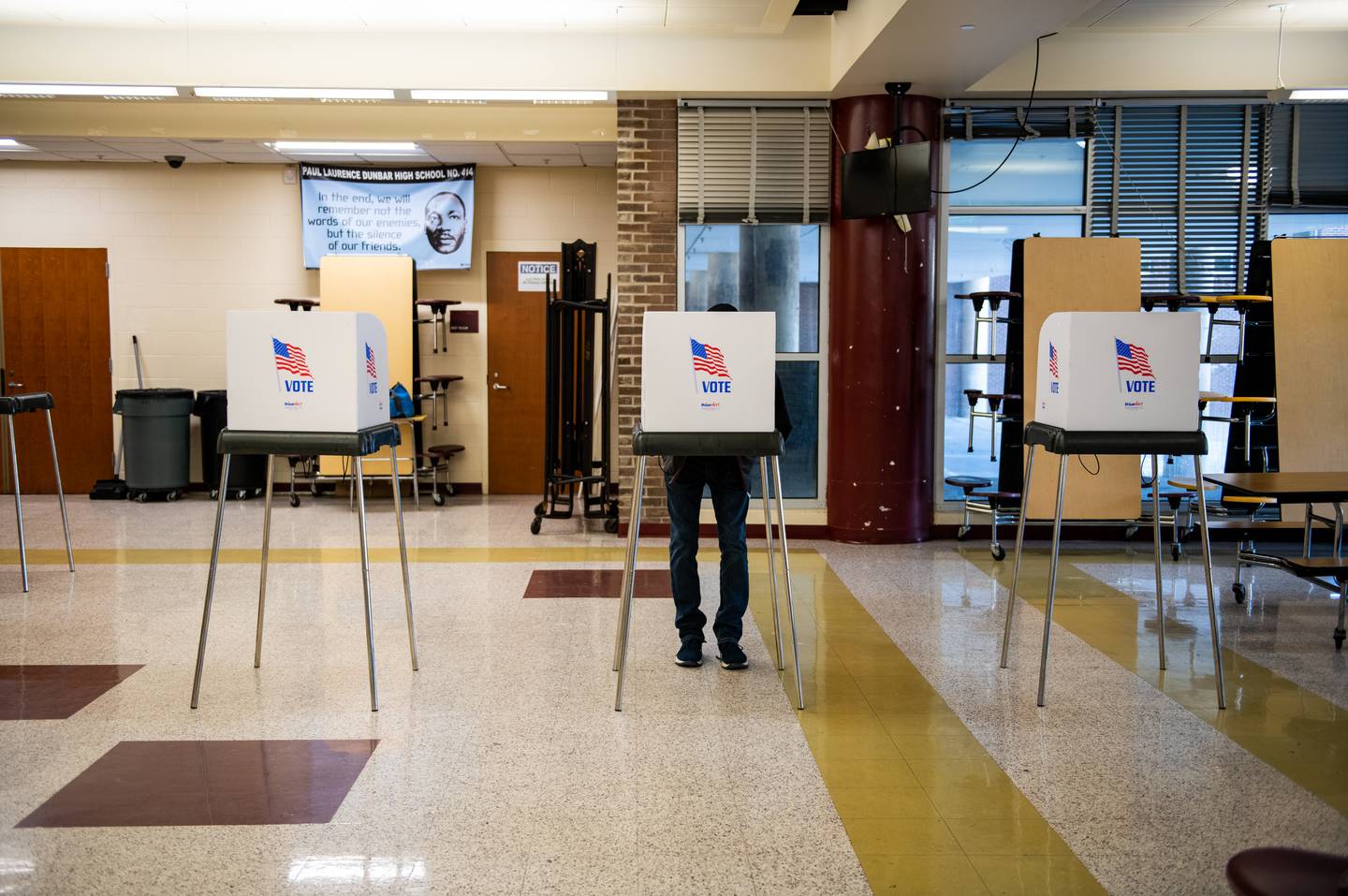 A person fills out their ballot at Paul Laurence Dunbar High School, in Baltimore, Md. on November 8, 2022.