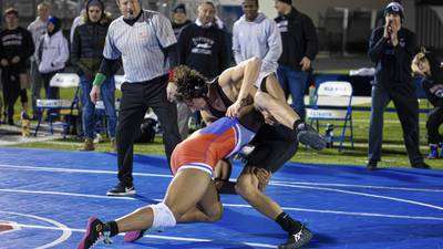 Why 2 Anne Arundel high schools wrestled outside on the first day of winter