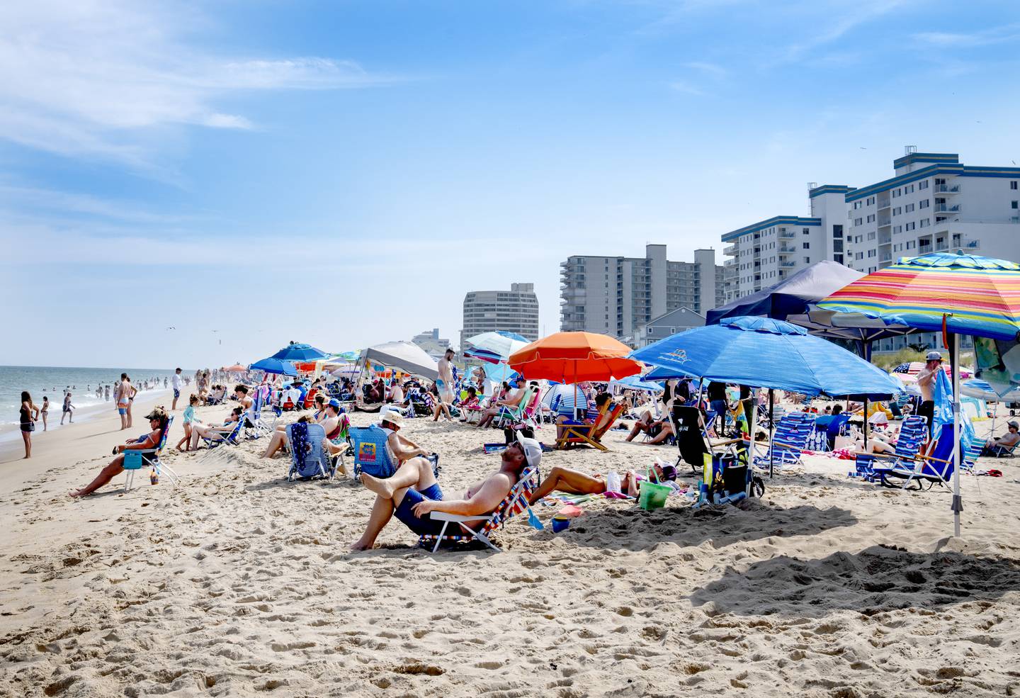 People enjoy the day at Ocean City Beach on Saturday, Aug. 12, 2023. The city is considering regulations on tents and canopies on the beach after the 2023 season.
