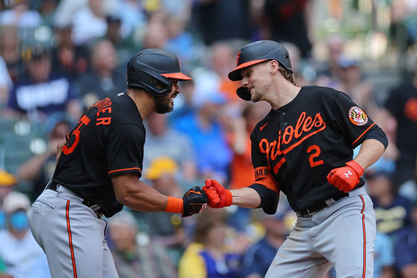MILWAUKEE, WISCONSIN - JUNE 08: Gunnar Henderson #2 of the Baltimore Orioles celebrates a two run home run with Anthony Santander #25 during the eighth inning against the Milwaukee Brewers at American Family Field on June 08, 2023 in Milwaukee, Wisconsin.