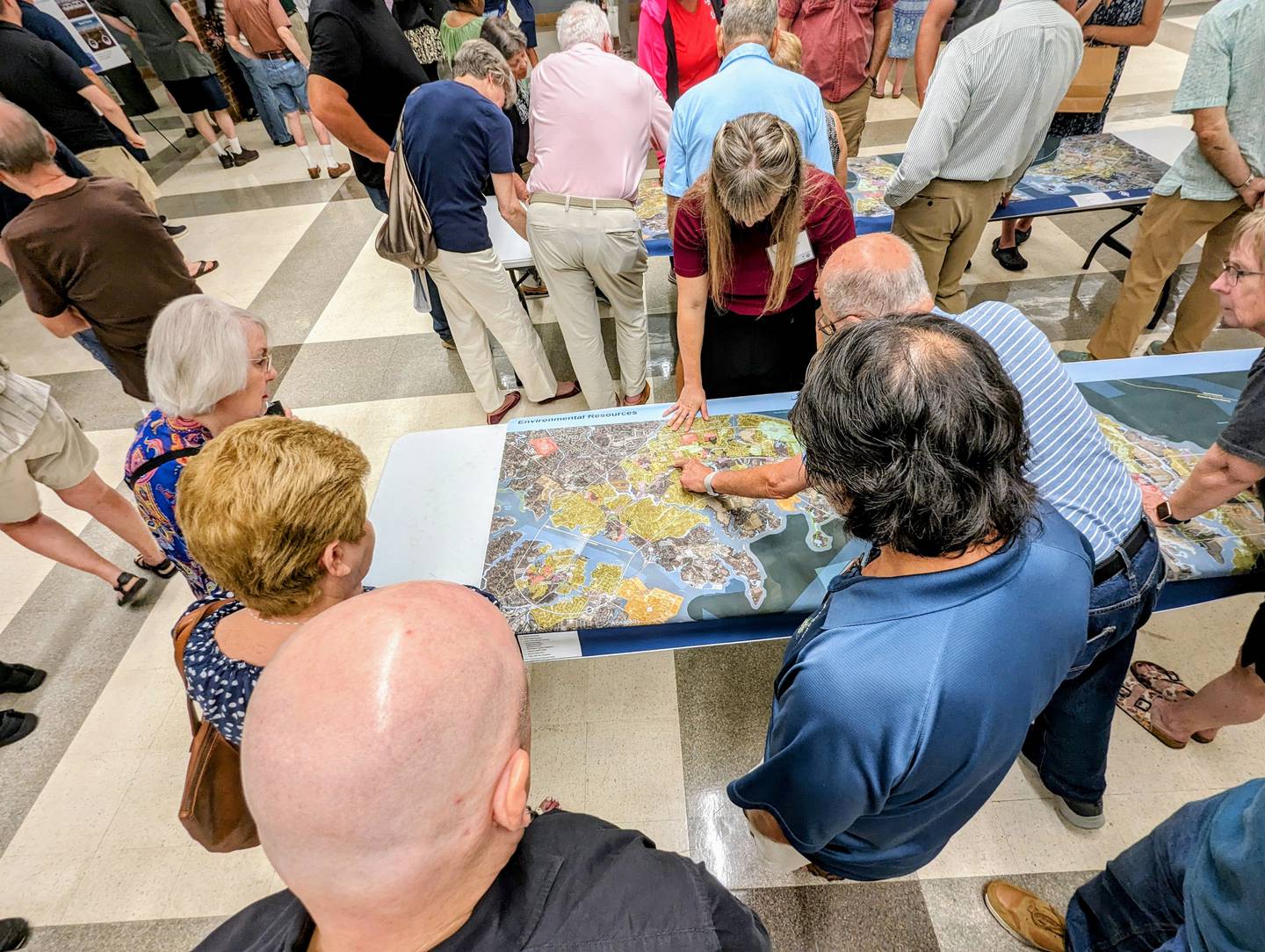 Participants in the Bay Crossing Study public forums at Broadneck High School in September point out features on a map to help the state figure out what to do about the Chesapeake Bay Bridge.