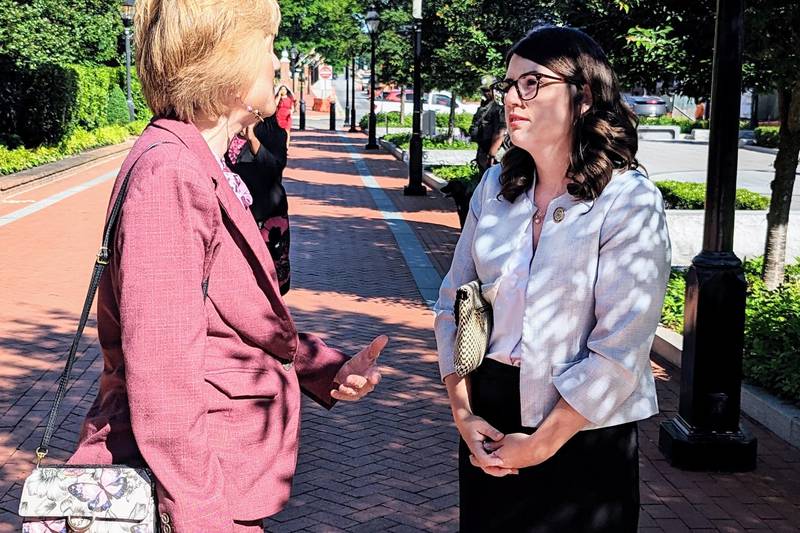 State Sen. Sarah Elfreth talks with Del. Shelia Ruth of Baltimore County Thursday morning in Annapolis. Ruth and others stopped Elfreth outside the State House to congratulate her on winning the Democratic primary for Congress in the 3rd District.