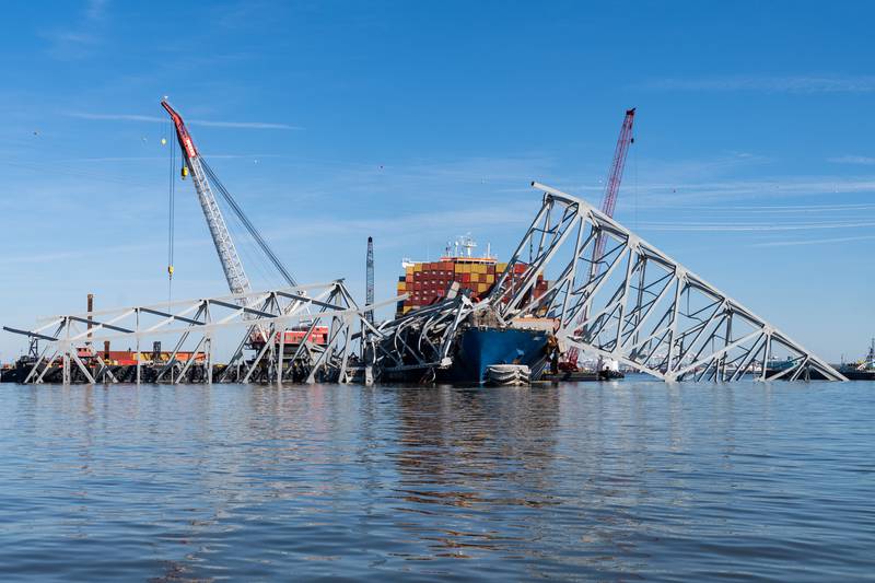 The Dali and collapsed Key Bridge are seen from the Catlett, a debris survey boat, on Tuesday, April 16, 2024.