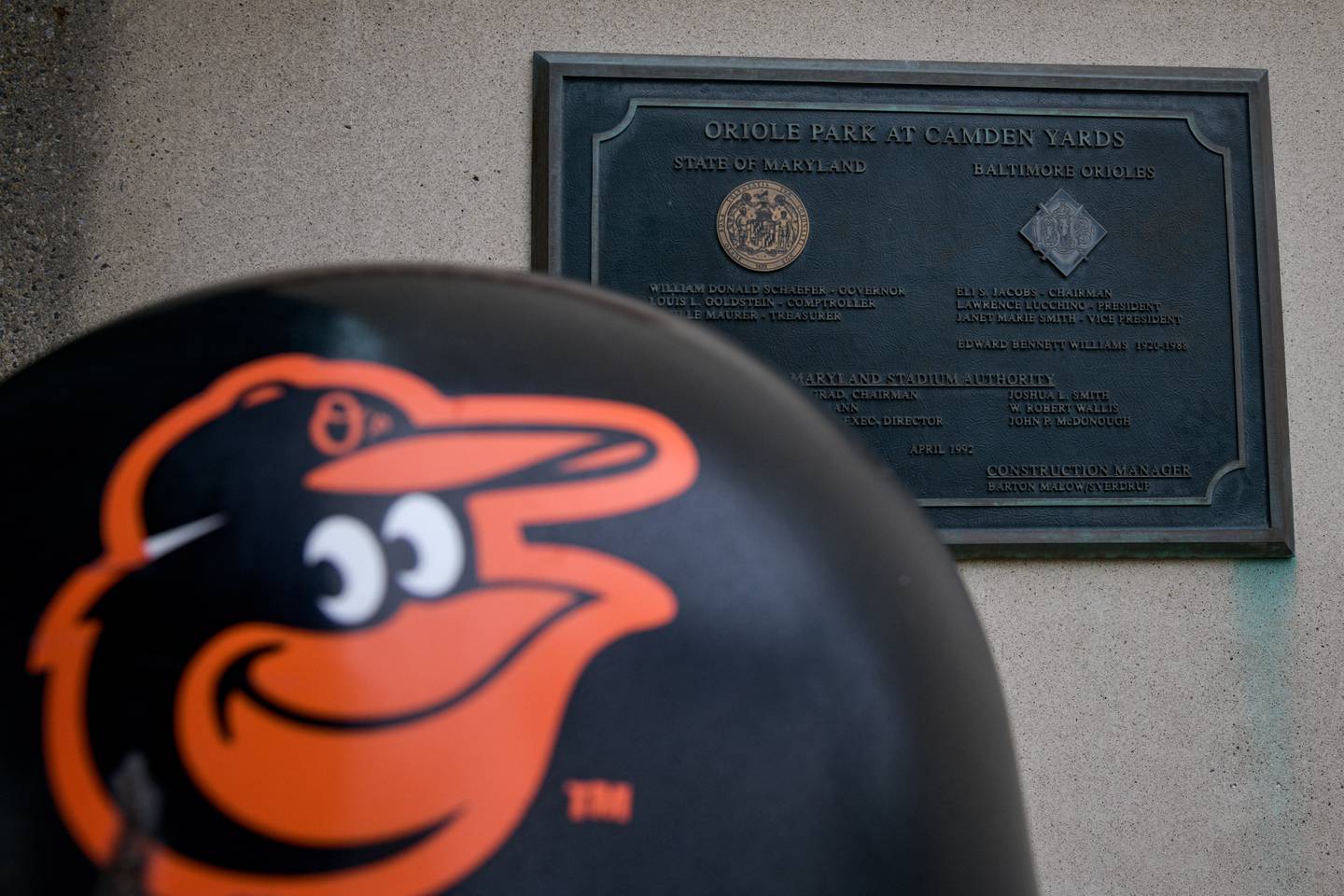 A Baltimore Orioles logo is painted on a trash can outside Oriole Park at Camden Yards in South Baltimore.