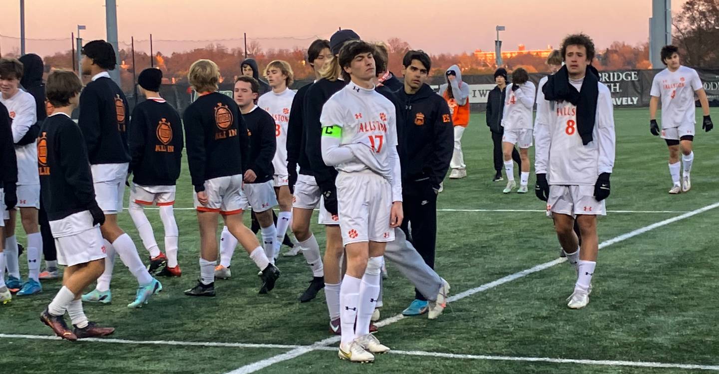 Fallston senior Christian Worthington stands dejectedly before the start of Saturday's Class 1A state boys soccer championship game awards ceremony. The No. 14 Cougars tied Brunswick late in regulation only to see the Washington County school score inside the opening minute of overtime for a 2-1 win at Loyola University's Ridley Athletic Complex in Northwest Baltimore.