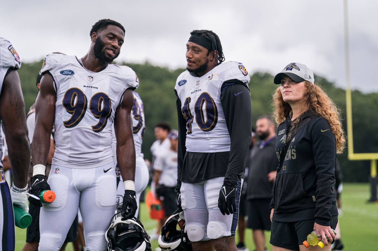 Ravens director of sports nutrition Sarah Snyder totes snacks to practice in order to keep players fueled. (Photo courtesy of Joey Pulone/Baltimore Ravens)