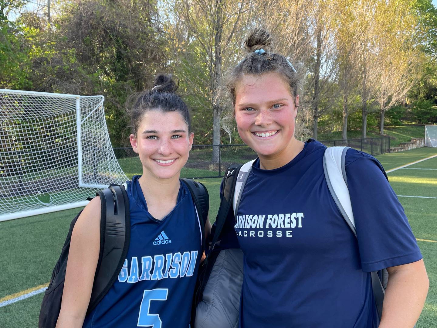 Gabby Laverghetta (5) scored five goals and had three assists as Garrison Forest topped Bryn Mawr, 14-7, in an IAAM A Conference lacrosse game Thursday. Grace Barta (right) and her defensive teammates held the Mawrtians to three goals until the final four and a half minutes.