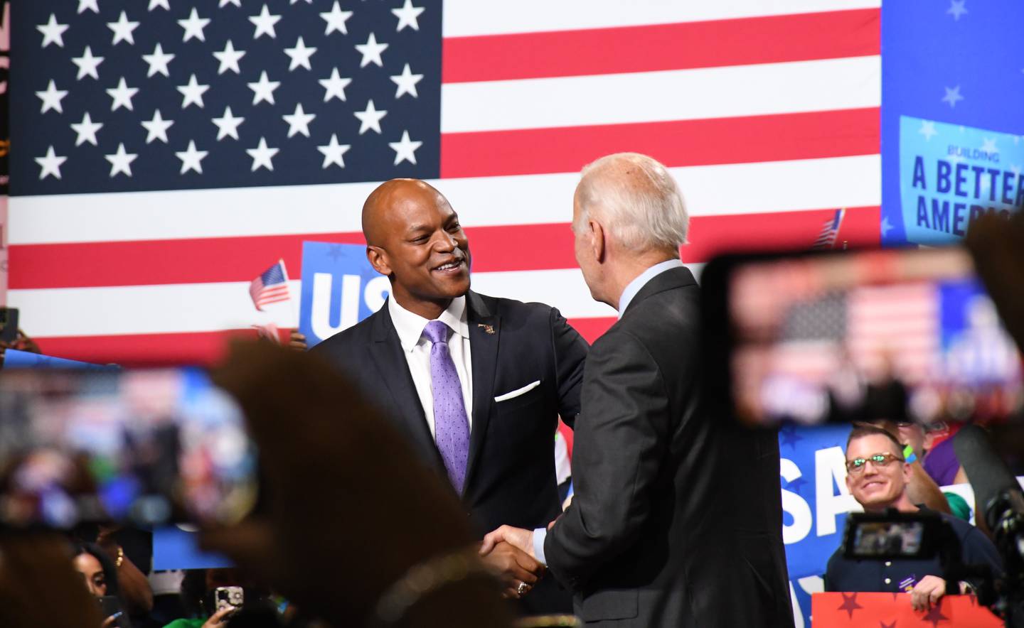 Maryland Democratic gubernatorial nominee Wes Moore welcomes President Joe Biden to the state at a rally at Richard Montgomery High School in Rockville on Aug. 25, 2022.