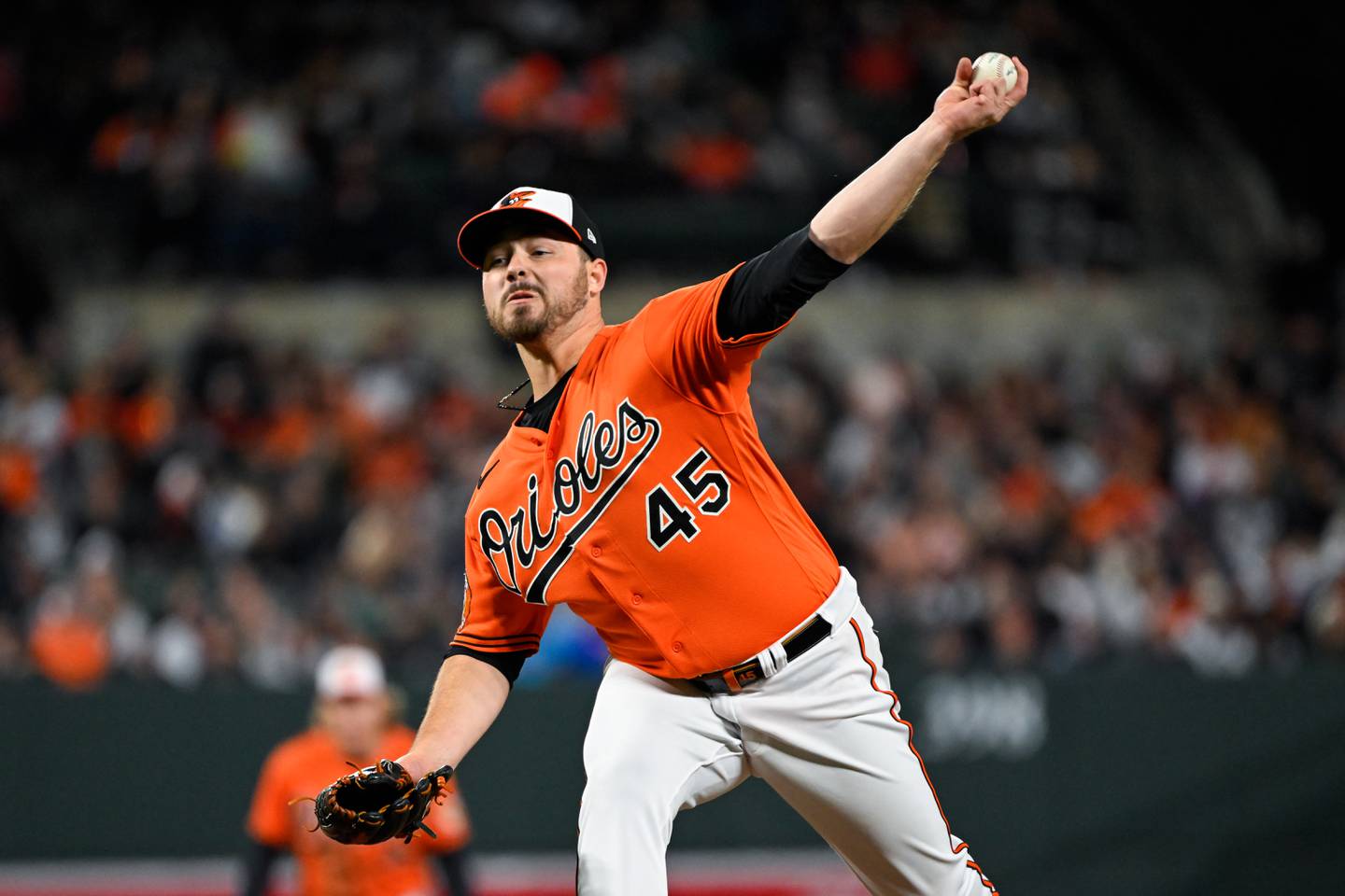 Baltimore Orioles relief pitcher Keegan Akin (45) throws during the eighth inning of an baseball game against the New York Yankees, Saturday, April 8, 2023, in Baltimore.