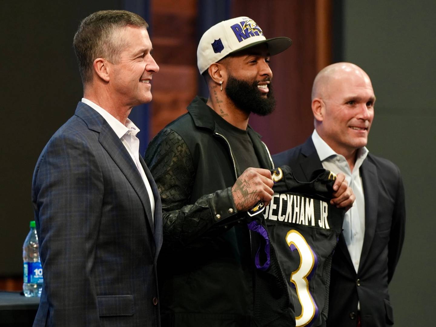 John Harbaugh (left), Odell Beckham Jr. (center), Eric DeCosta (right) at an introductory press conference at the Under Armour Performance Center, on April 13, 2023.