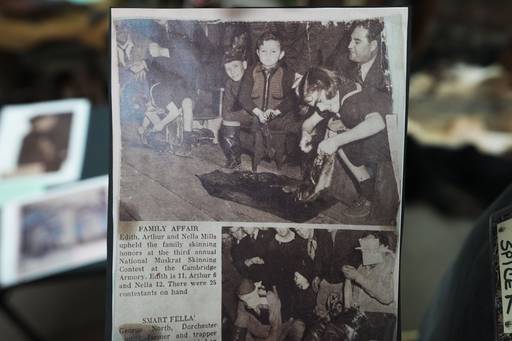 A newspaper clipping fromThe Baltimore Sun in 1938 shows Nellie Flowers skinning a muskrat in one of the first ever skinning competitions.