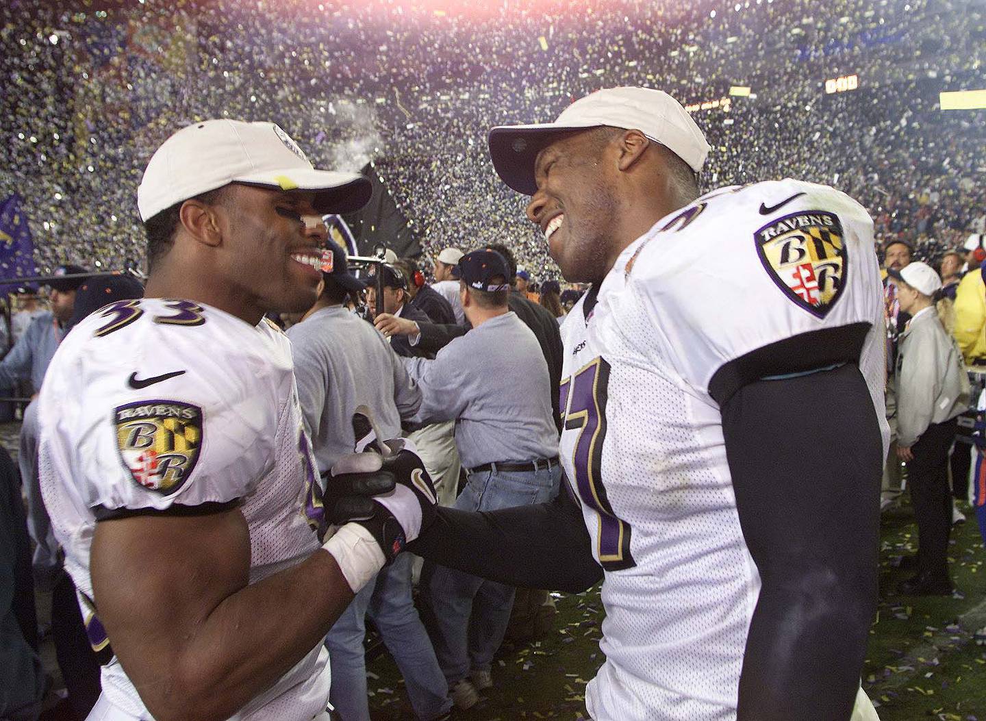 28 Jan 2001:   Priest Holmes #33 and O.J. Brigance of the Baltimore Ravens celebrate after defeating the New York Giants 34-7 in Super Bowl XXXV at Raymond James Stadium in Tampa, Florida.  DIGITAL IMAGE. Mandatory Credit: Tom Hauck/ALLSPORT