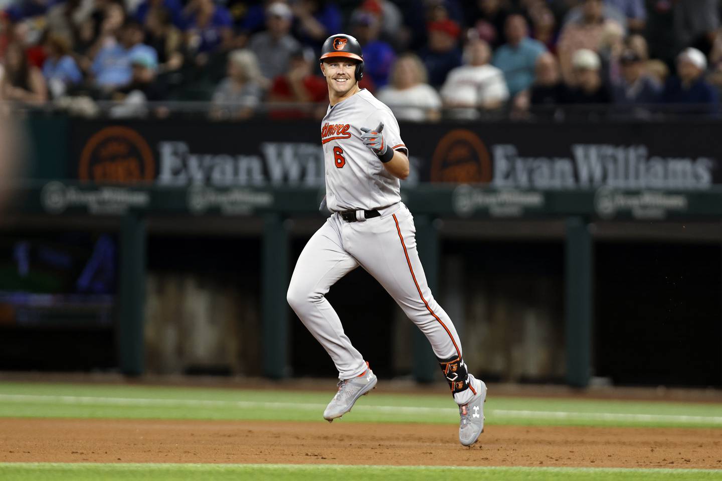 ARLINGTON, TEXAS - APRIL 04: Ryan Mountcastle #6 of the Baltimore Orioles rounds the bases after hitting a three run home run in the second inning against the Texas Rangers at Globe Life Field on April 04, 2023 in Arlington, Texas.