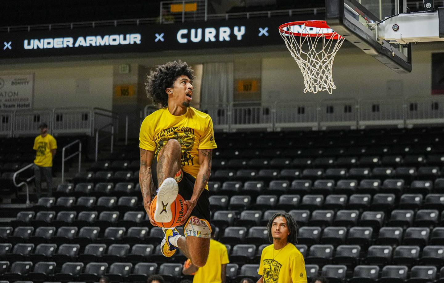Bryce Johnson, Guard UMBC Men's Basketball, rises up for an authoritative slam dunk at the Stephen Curry Baltimore Showcase  Live at UMBC on August 17, 2023.