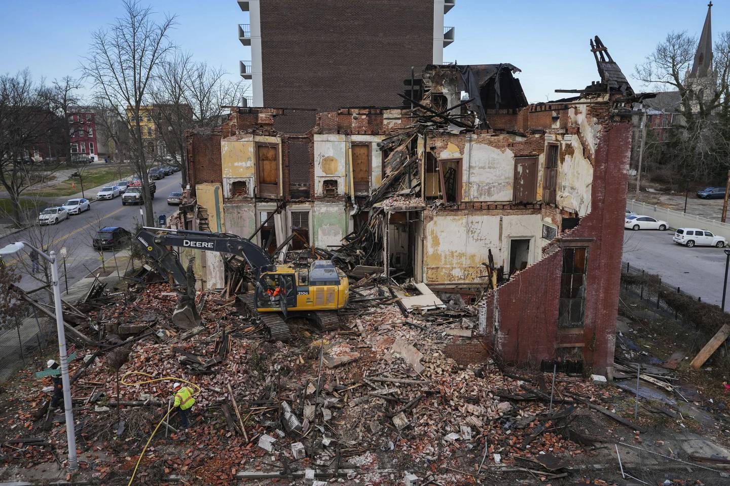 Seller's Mansion, which caught fire early on February 24, 2023, is torn down that same afternoon.