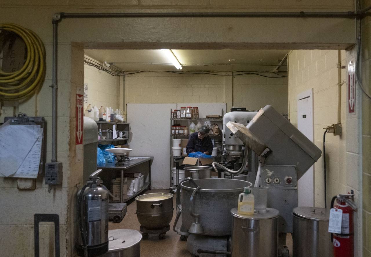 Larry Desantis prepares baked goods inside of Herman's Bakery, in Dundalk on March 28, 2024.