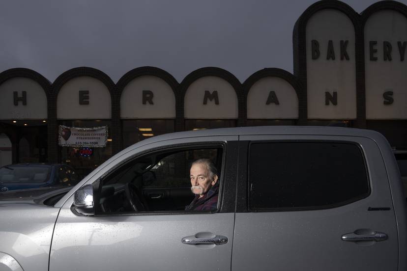Larry Desantis poses for a portrait outside his workplace, Herman's Bakery, in Dundalk on March 28, 2024. Desantis was one of the last drivers to cross the bridge moments before it collapsed.