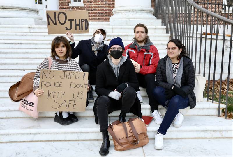 Students at Johns Hopkins University that oppose the formation of a private police force.