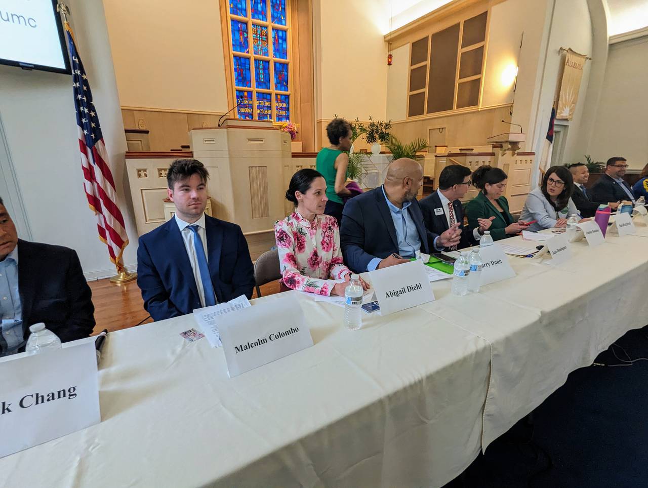Candidates sat at a long table covered by a white cloth inside the Eastport United Methodist Church on April 17, creating a tableau the pastor admitted looked unexpectedly like the last supper.