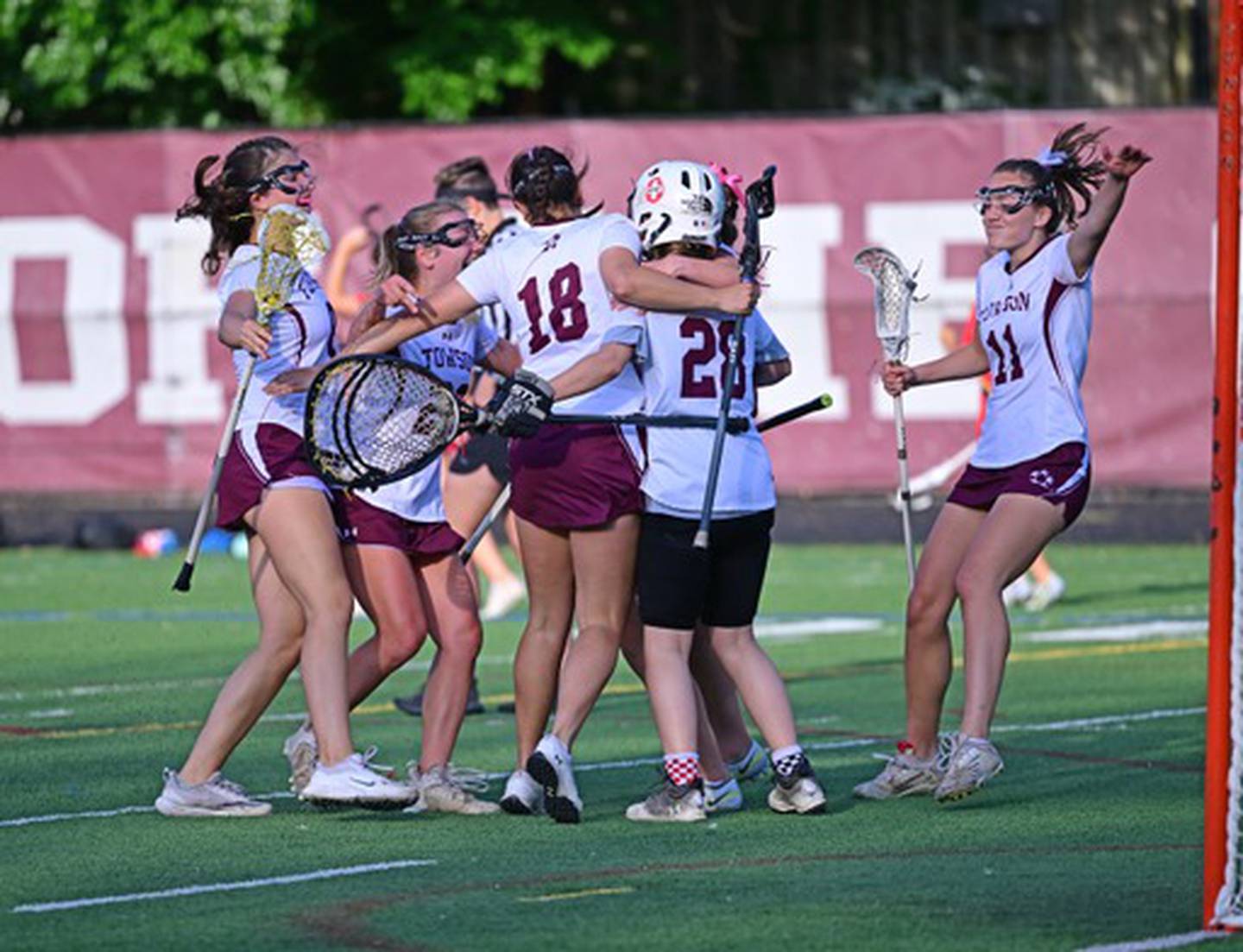 Towson's girls lacrosse team celebrate after the final buzzer in Monday's Baltimore County championship game. The 11th-ranked Generals claimed their first crown since 2009 with a 15-4 victory over Dulaney.