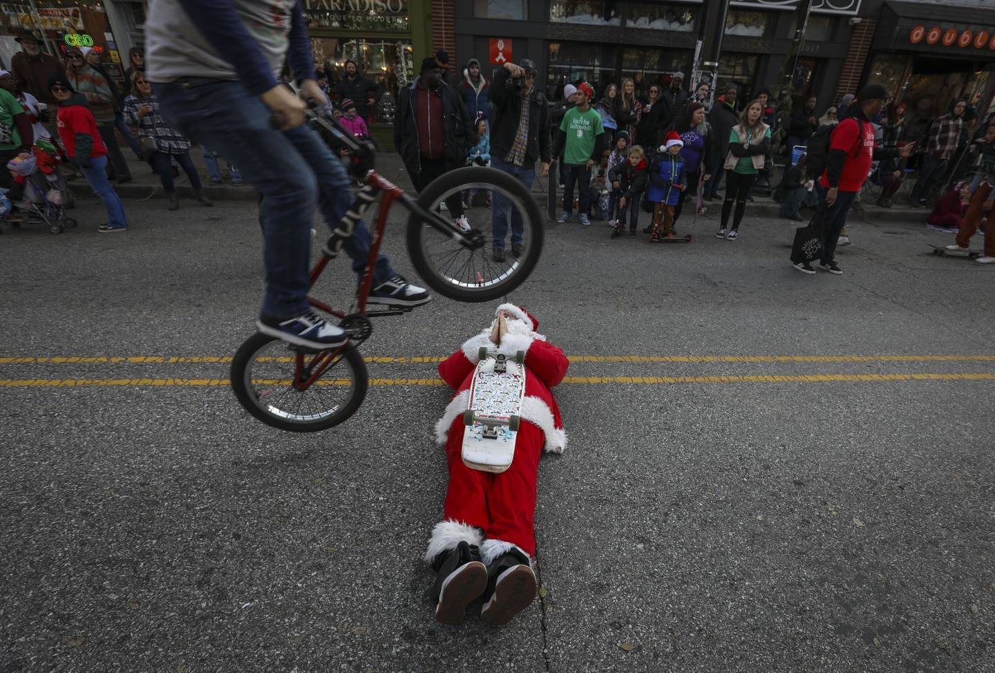 Jimmy Pelletier, from DC Wheels Charity, wows the crowds with skateboard moves at Hampden's Annual Holiday Parade on December 4, 2022.