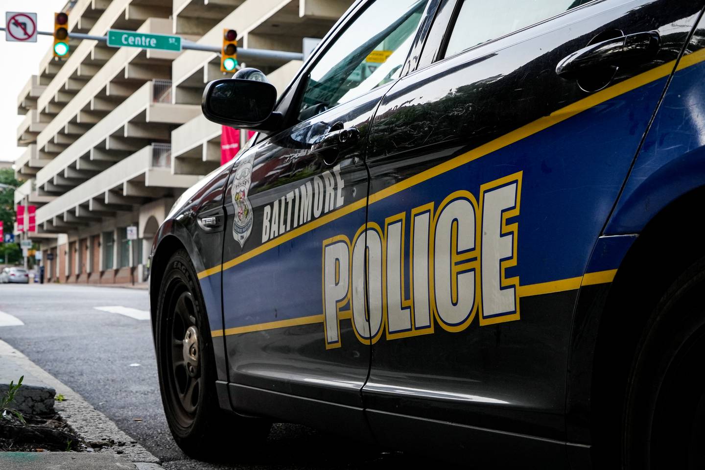 A Baltimore City Police car sits parked on North Calvert St.